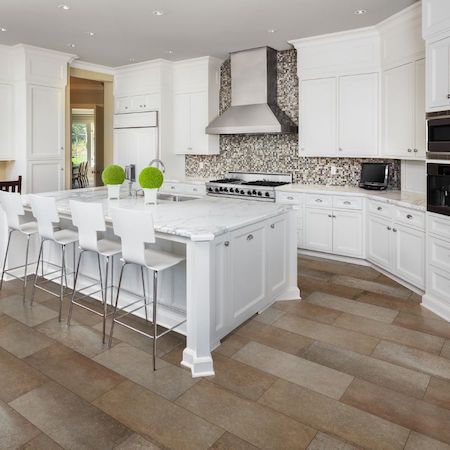 countertops in a bright white kitchen with island